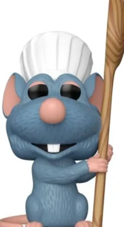 Rémy avec une cuillère de cuisine